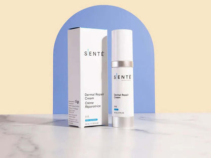 Senté Dermal Repair Cream bottle with packaging on pastel background for redness relief and skin comfort care.