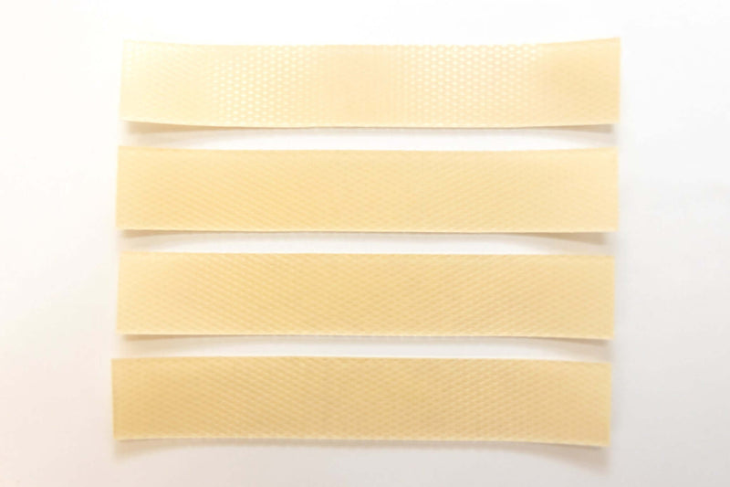 Silagen beige strips laid flat showing narrow beige silicone sheets designed for long narrow scar coverage
