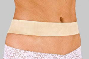 A long beige Silagen silicone strip for extremity scar treatment featuring a flexible and thin medical-grade design.
