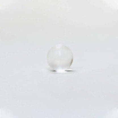 Silagen umbilical sphere shown on white background, a medical-grade silicone sphere designed for belly button scar coverage.