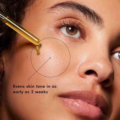 Clinical claim for Skinceuticals Discoloration Defense serum showing it evens skin tone in as early as 2 weeks.