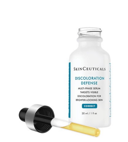Skinceuticals Discoloration Defense multi-phase serum bottle for treating hyperpigmentation and achieving brighter skin.