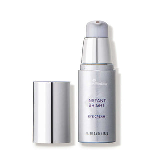 SkinMedica Instant Bright Eye Cream open pump bottle with applicator for brightening and smoothing under-eye skin care
