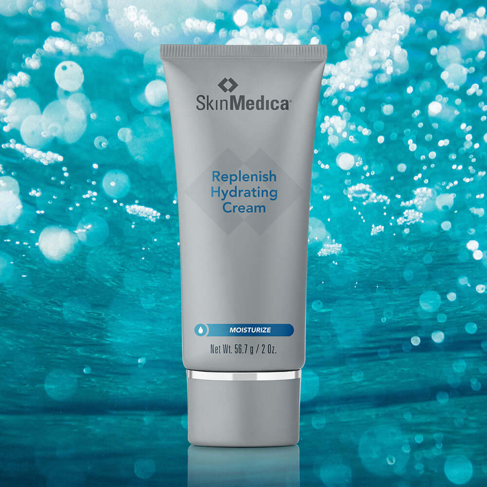 SkinMedica Replenish Hydrating Cream tube on blue water background showing moisture support for dry, dehydrated skin now use