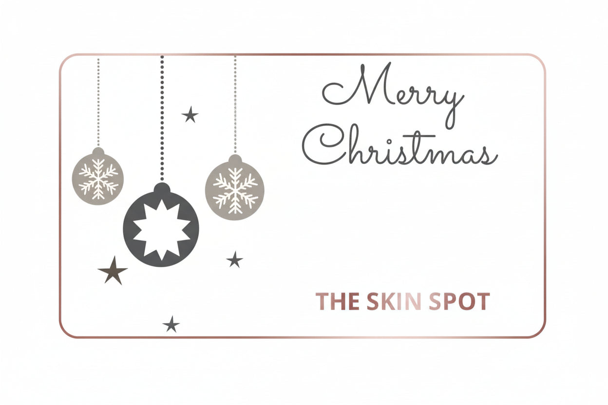 The Skin Spot Christmas gift card with ornaments and holiday design for festive skincare gifting and beauty shopping online.